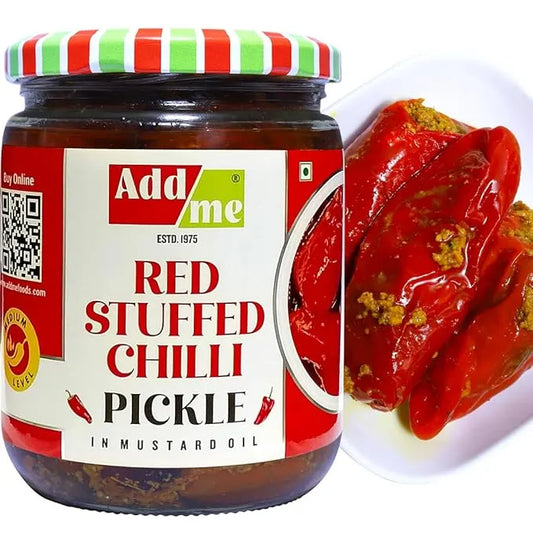Jar of Add me Red Stuffed Chilli Pickle with a close-up of the pickle on a white plate. mango pickle, chilli pickle