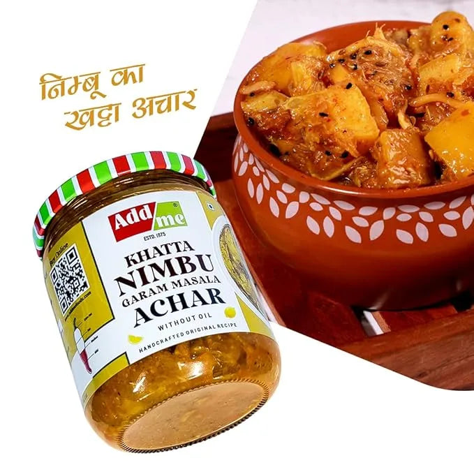 Jar of Add Me Khattha Nimbu Garam Masala Achar with a bowl of pickle on a white background