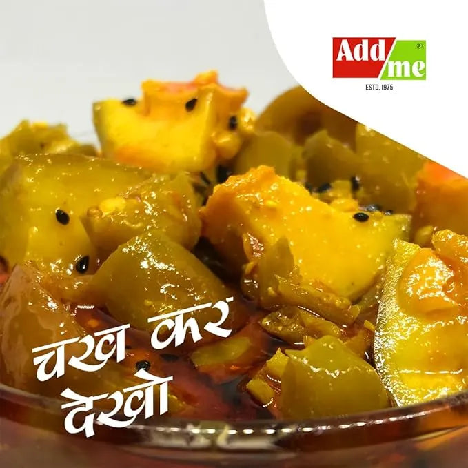 Mango pickle in a glass bowl with 'Add Me' logo in the corner
