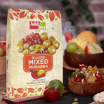 Packaging of Add Me Glazed Mixed Murabba with fruit in the background