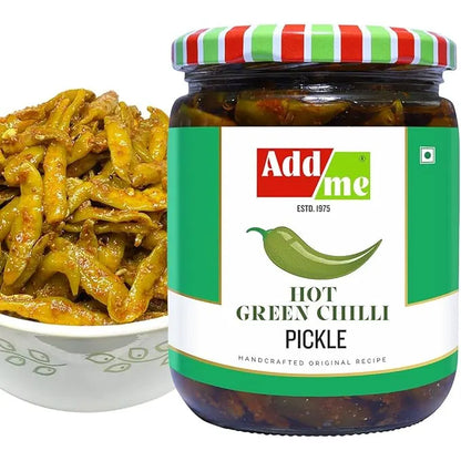 Jar of Add Me hot green chili pickle with a bowl of pickles on a white background