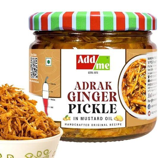 Jar of Adrak Ginger Pickle with a striped lid, Add Me brand label, and a bowl of pickles.