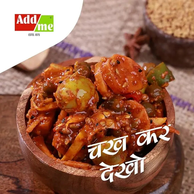 Wooden bowl of spicy dish withAdd me logo and text in a foreign language.