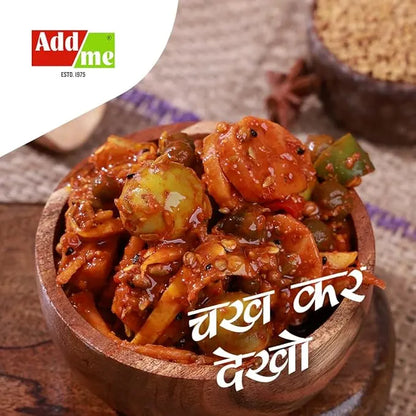 Wooden bowl of spicy dish withAdd me logo and text in a foreign language.