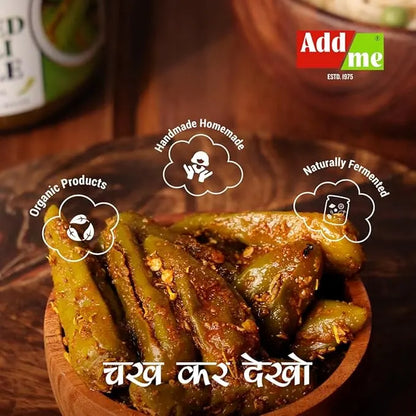 Spiced green chilies in a wooden bowl with 'Add Me' branding.