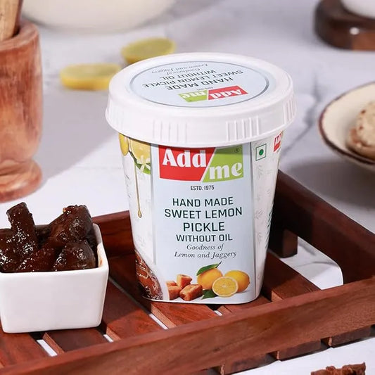 Addme hand made sweet lemon pickle container on a wooden tray with a white background