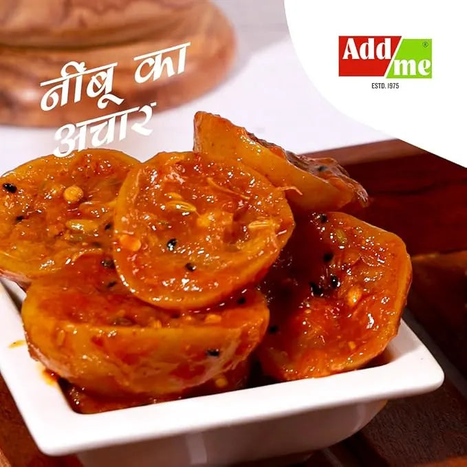 Sliced pickled tomatoes in a white bowl with 'Add Me' logo in the corner.