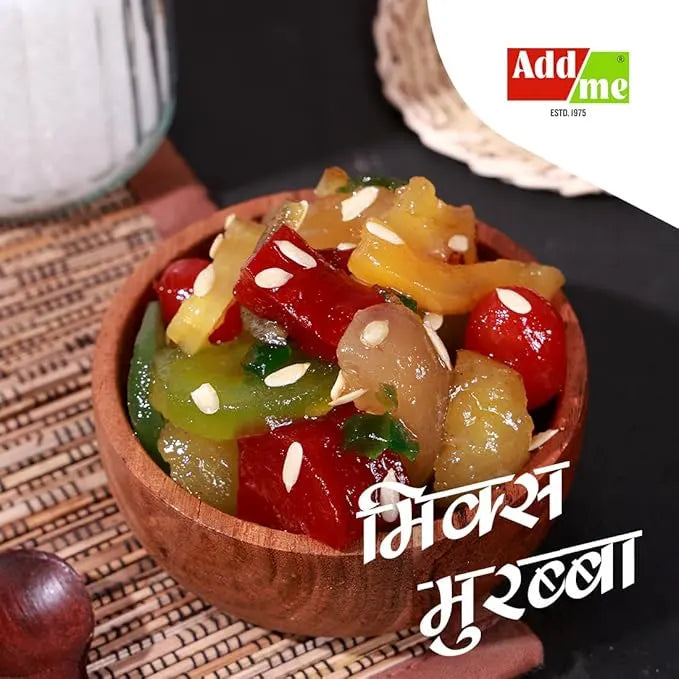 Add Me Foods: Wooden bowl filled with colorful pickled vegetables on a woven mat, with 'Add Me' brand logo in the corner.