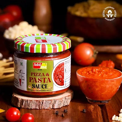 Add Me Foods: Jar of pizza and pasta sauce with a striped lid on a wooden surface, surrounded by ingredients.